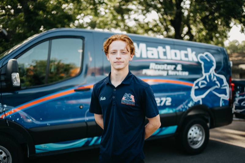 Matlock team member in company shirt, outdoor portrait