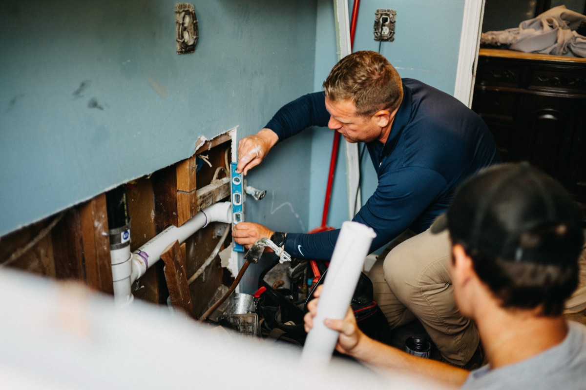 Several Matlock technicians collaborating on a repair